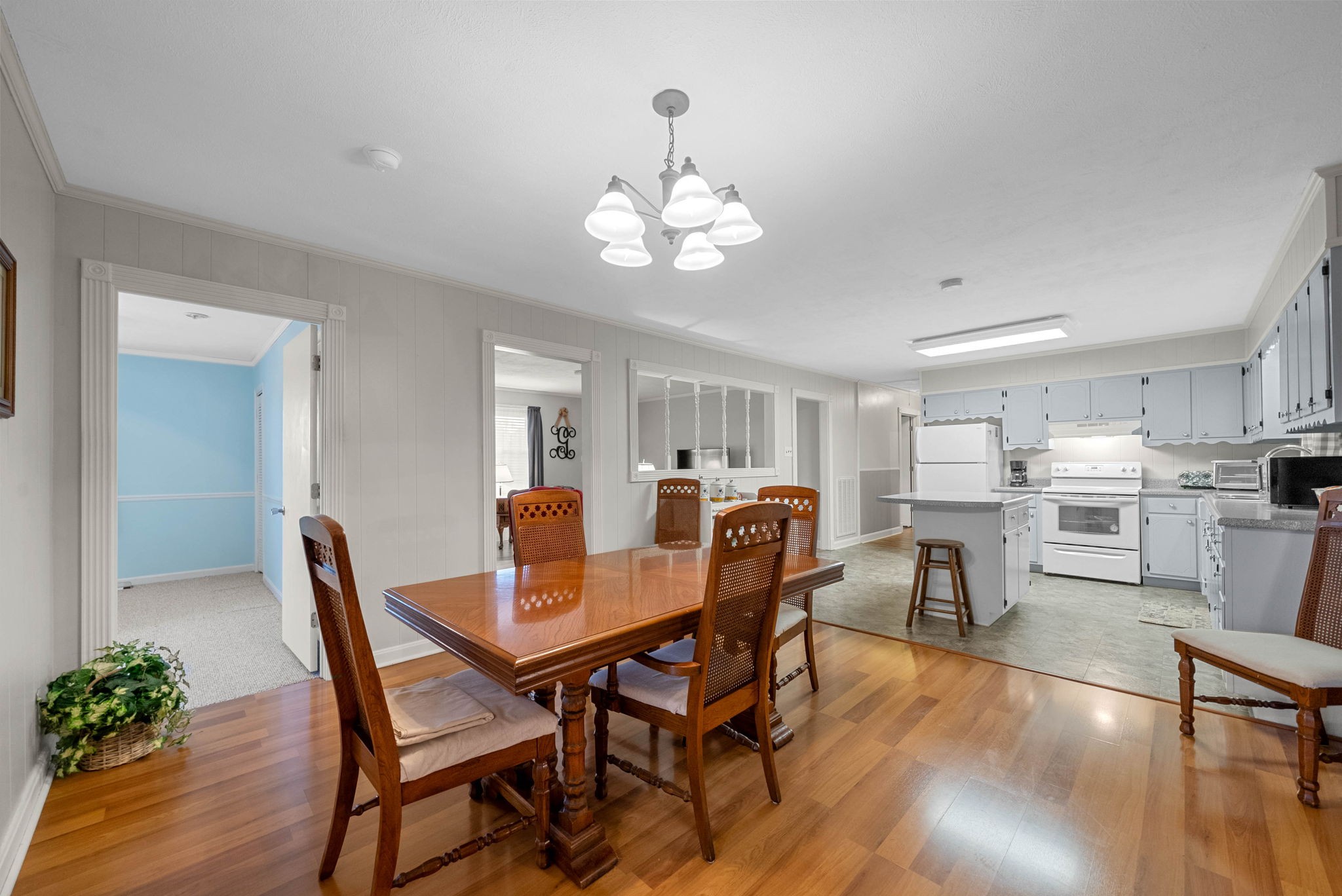 5675 Princeton Road Hopkinsville, KY 42240 - Photo 14 of 38 a view of a dining room with furniture and wooden floor