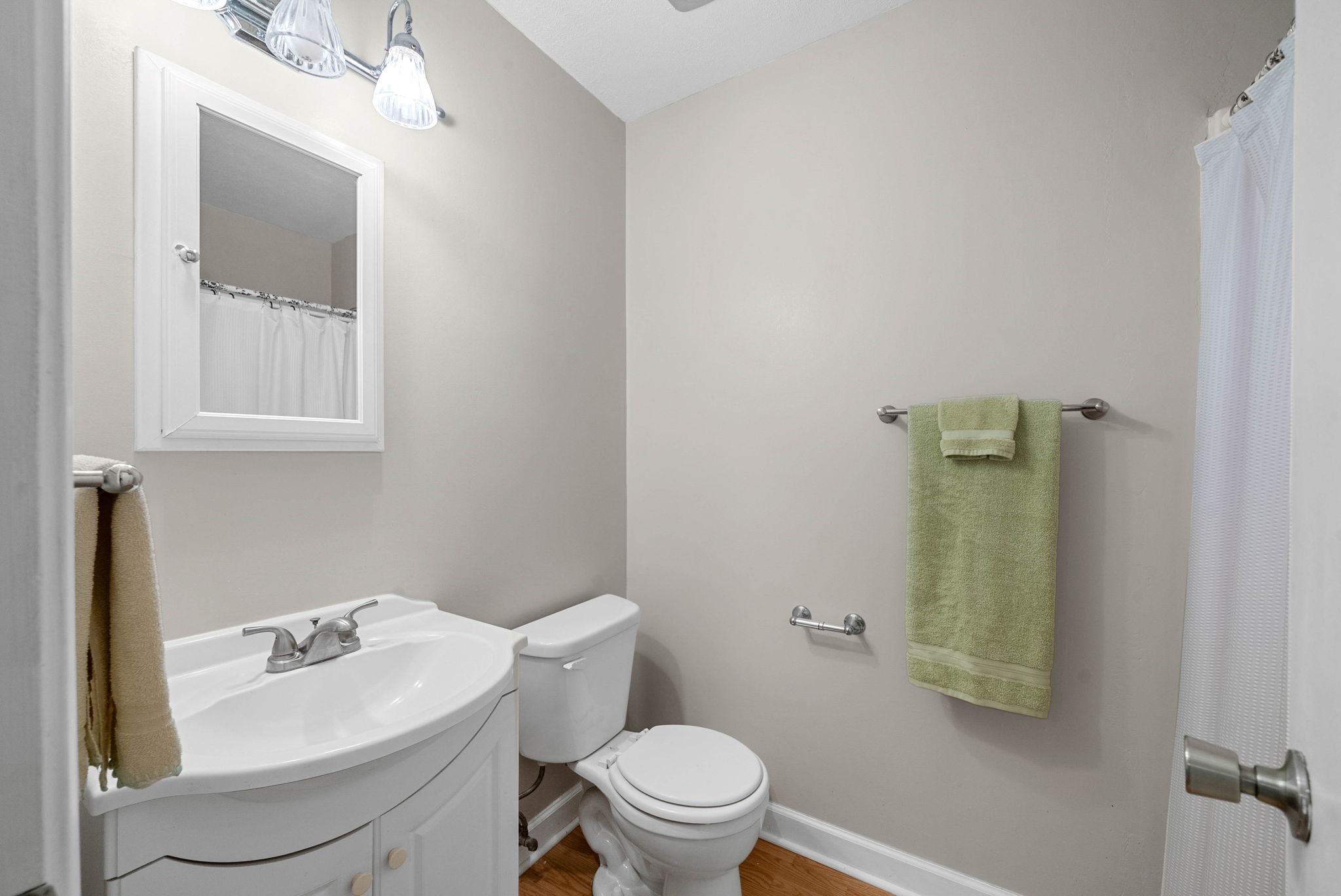 5675 Princeton Road Hopkinsville, KY 42240 - Photo 20 of 38 a bathroom with a toilet sink and mirror