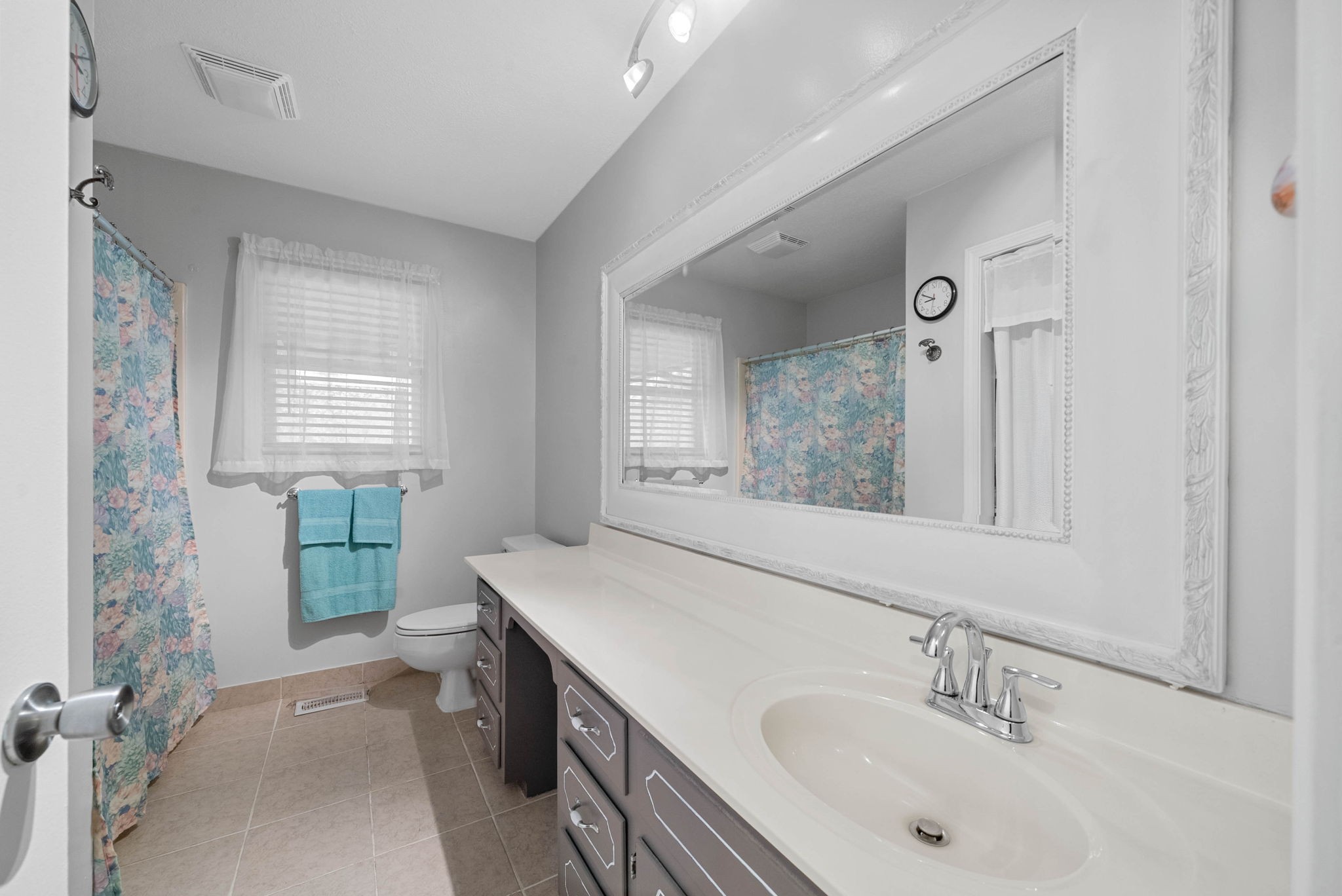 5675 Princeton Road Hopkinsville, KY 42240 - Photo 23 of 38 a bathroom with a sink and a mirror