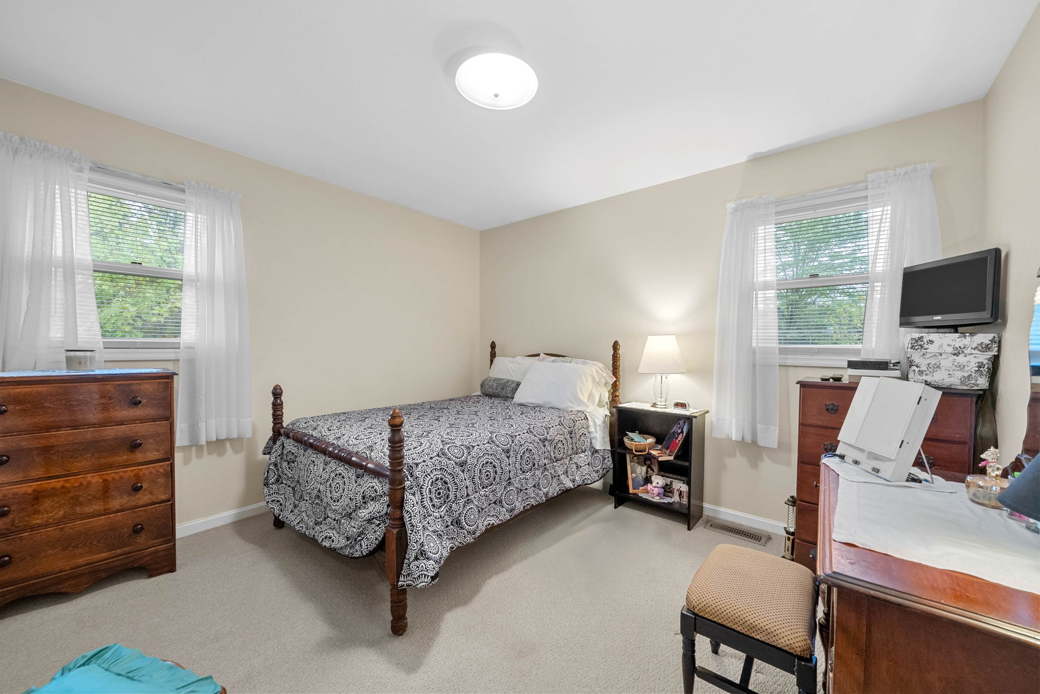 5675 Princeton Road Hopkinsville, KY 42240 - Photo 26 of 38 a bedroom with a bed and furniture