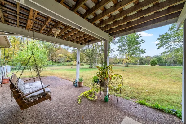 a view of outdoor space with deck and garden
