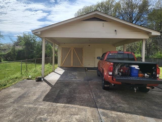 4985 Millbranch Road Memphis, TN 38116 - Photo 2 of 8 a view of a house with backyard and porch
