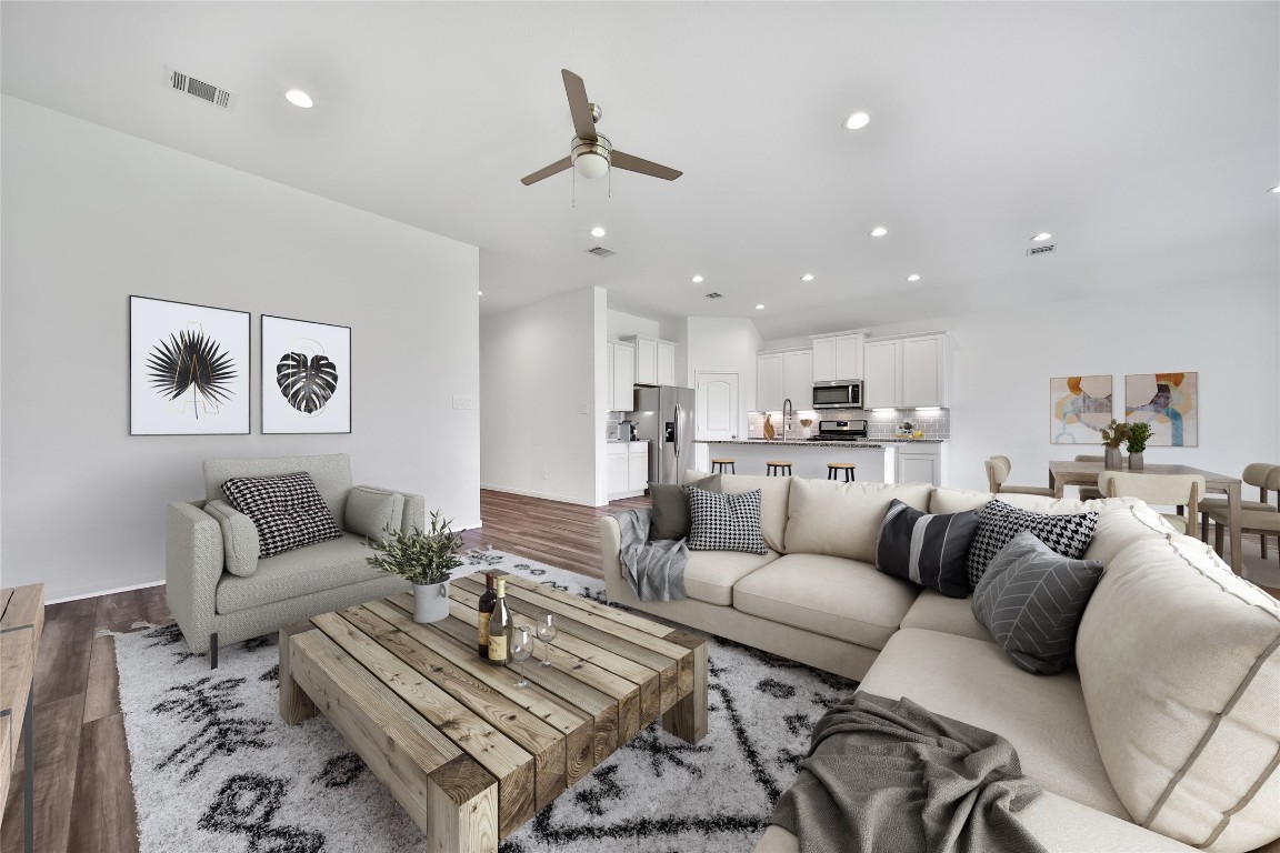 906 Youth Water Road Montgomery, TX 77316 - Photo 18 of 42 a living room with furniture kitchen and a table