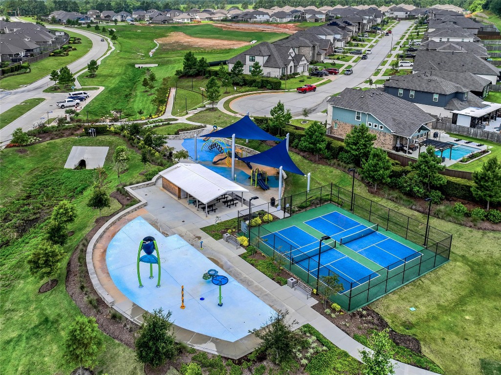 906 Youth Water Road Montgomery, TX 77316 - Photo 3 of 42 an aerial view of a house with a swimming pool yard and outdoor seating