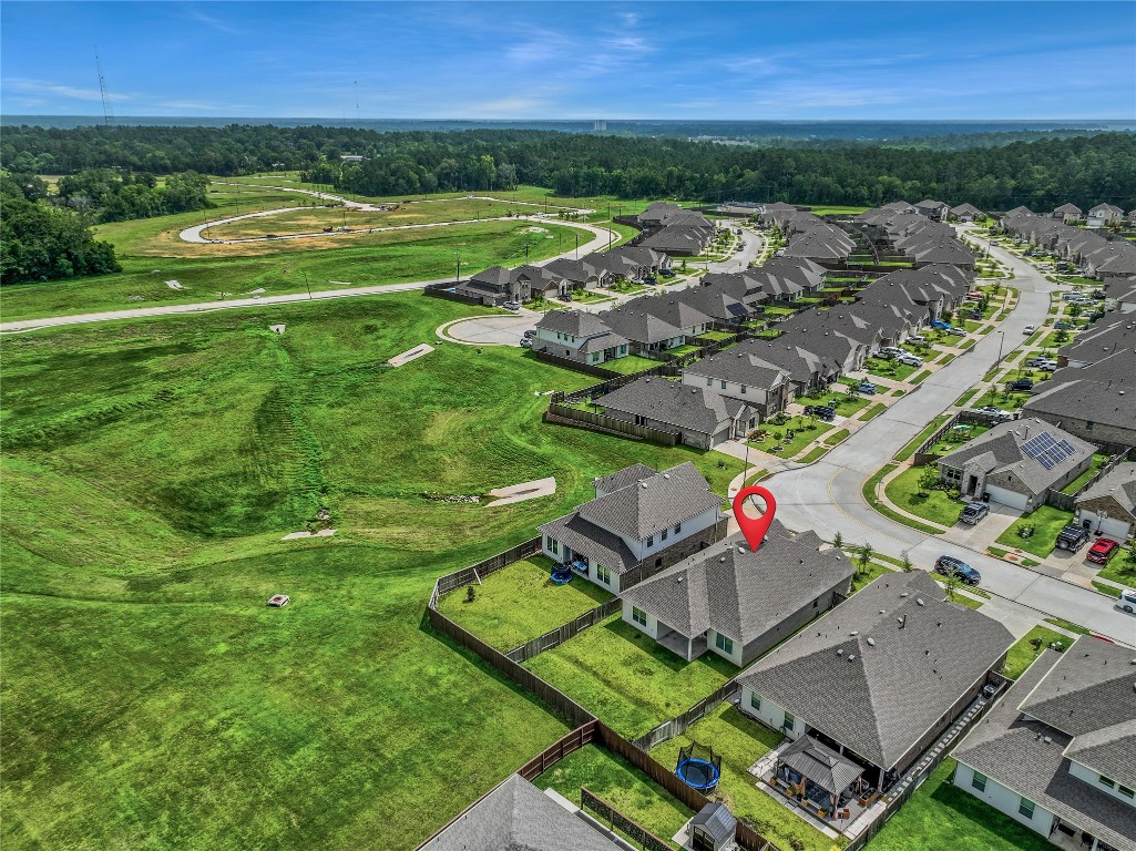 906 Youth Water Road Montgomery, TX 77316 - Photo 30 of 42 an aerial view of a house with big yard