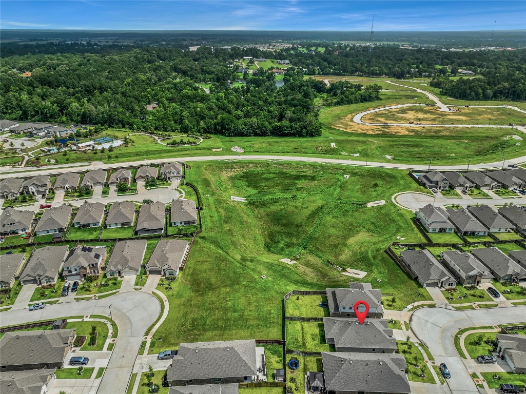 906 Youth Water Road Montgomery, TX 77316 - Photo 31 of 42 a view of a balcony with outdoor space