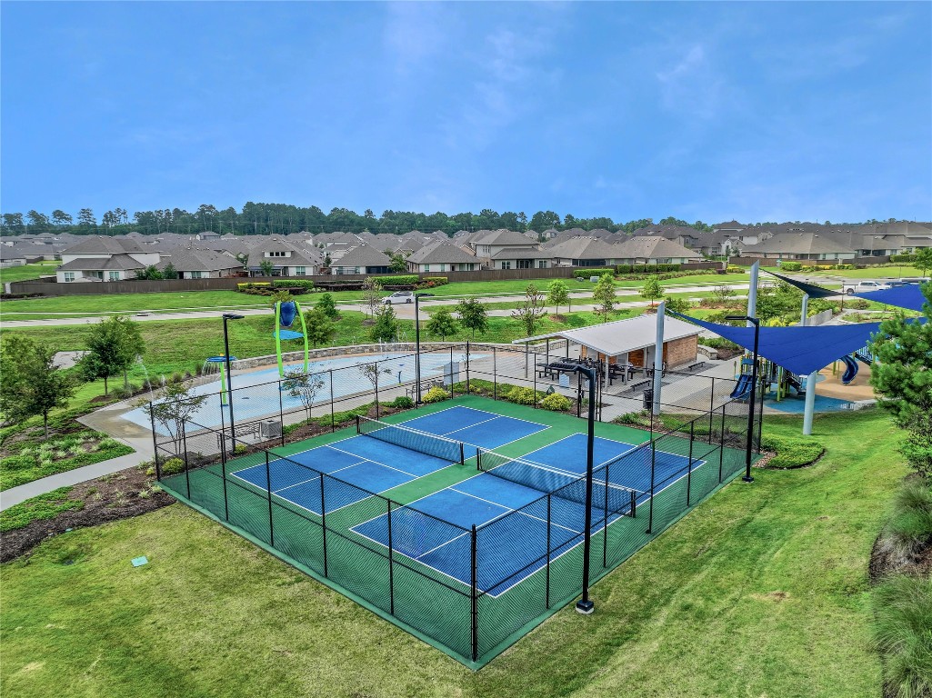 906 Youth Water Road Montgomery, TX 77316 - Photo 36 of 42 an outdoor view with a garden