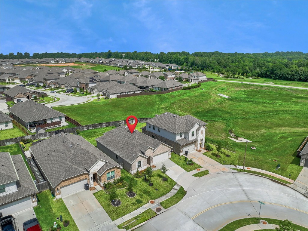 906 Youth Water Road Montgomery, TX 77316 - Photo 4 of 42 an aerial view of a house with garden space and street view