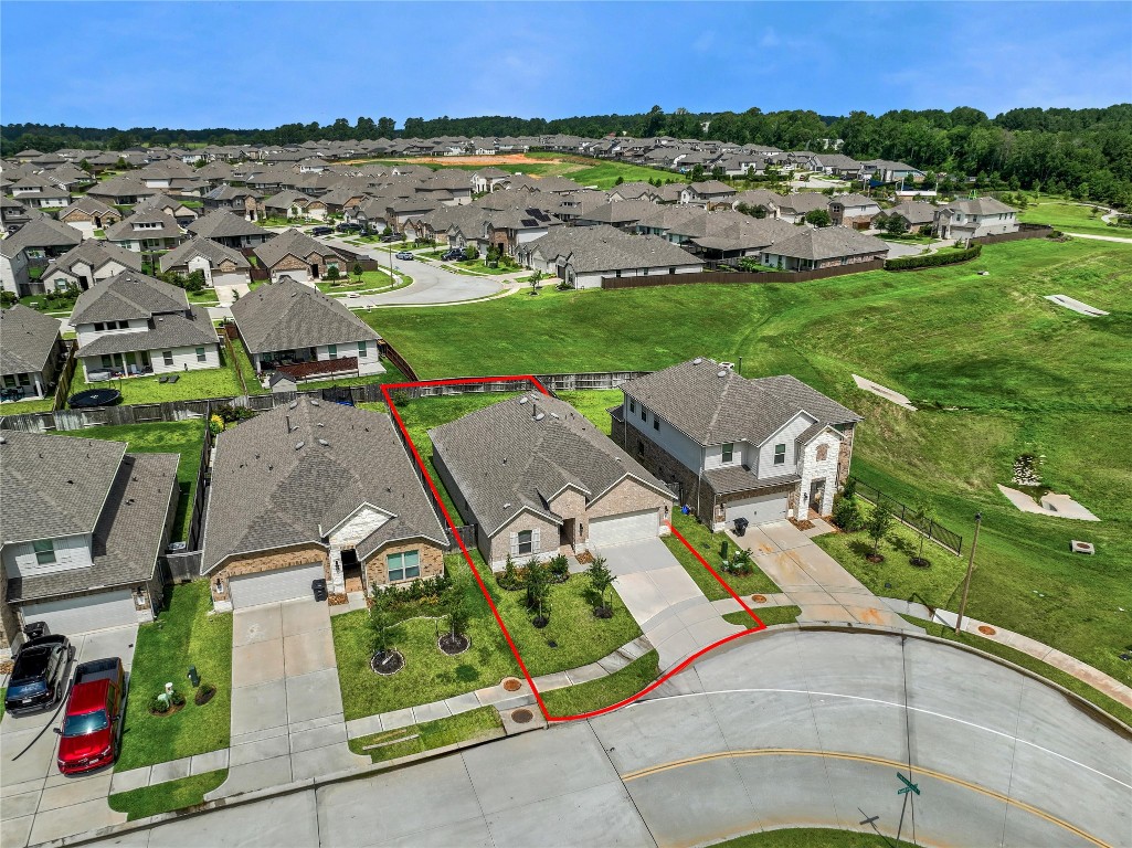 906 Youth Water Road Montgomery, TX 77316 - Photo 5 of 42 an aerial view of multiple house