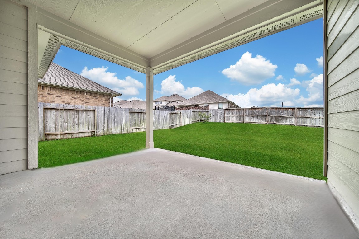906 Youth Water Road Montgomery, TX 77316 - Photo 10 of 42 a view of a house with backyard and porch