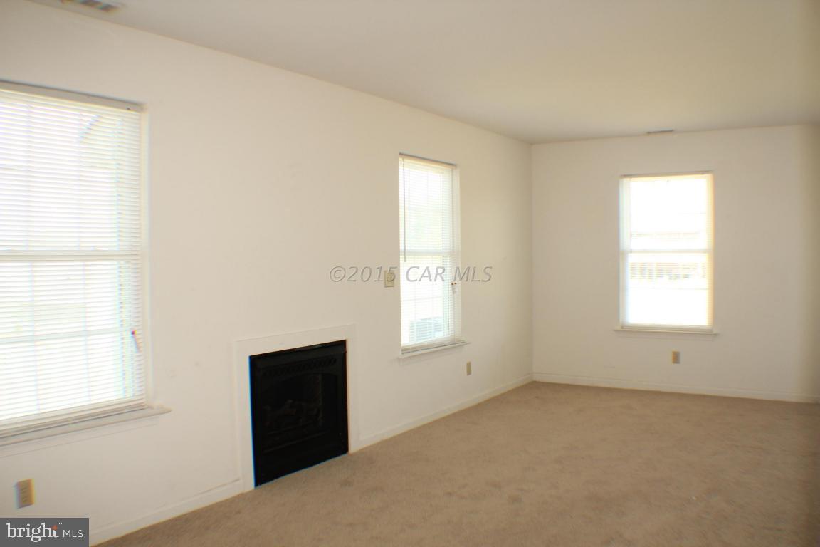 8133 Libertytown Road Berlin, MD 21811 - Photo 7 of 25 an empty room with windows