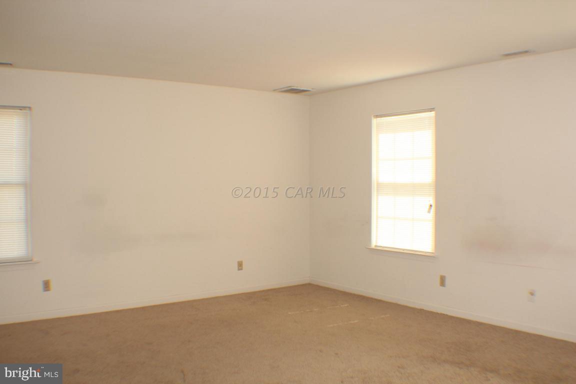 8133 Libertytown Road Berlin, MD 21811 - Photo 9 of 25 an empty room with a window
