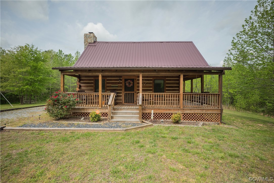 2095 Eureka Mill Road Keysville, VA 23947 - Photo 1 of 43 a front view of a house with a garden
