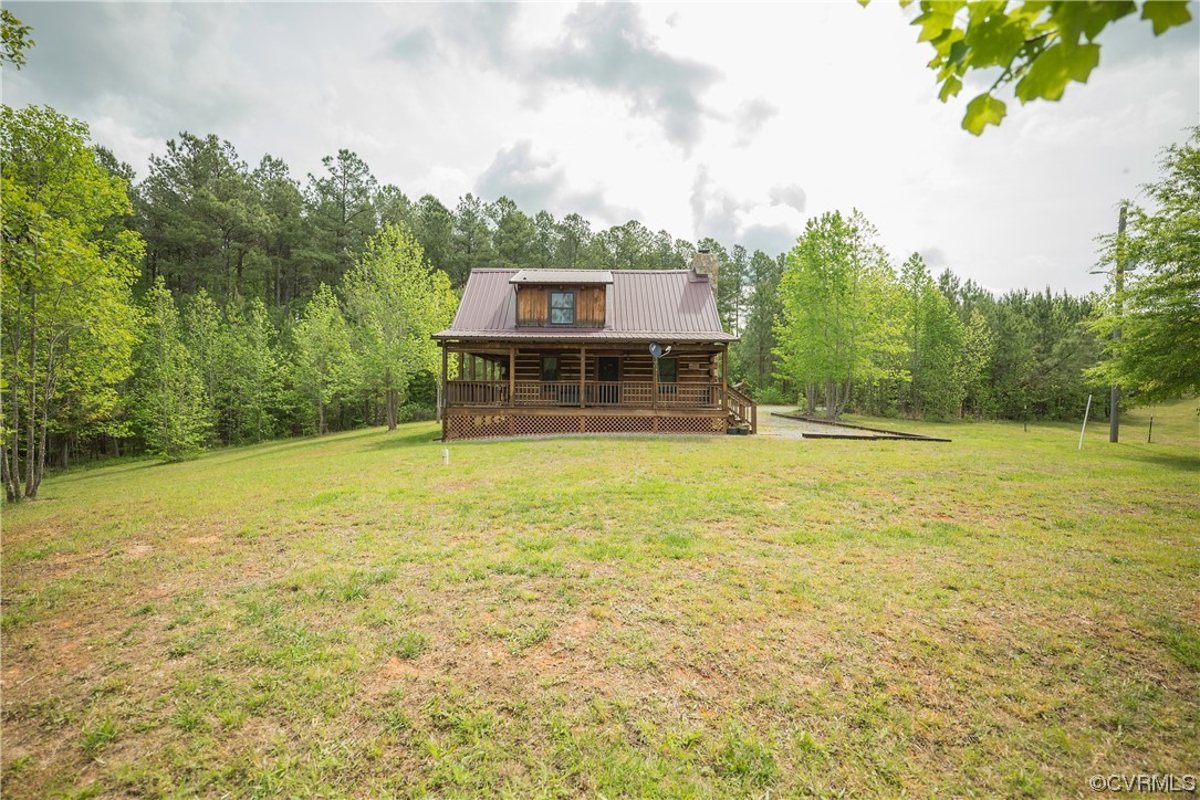 2095 Eureka Mill Road Keysville, VA 23947 - Photo 17 of 43 a house view with swimming pool in front of it