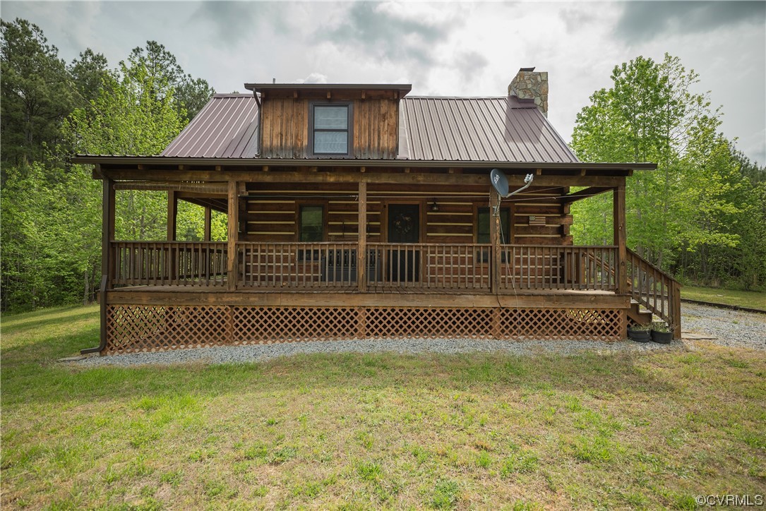 2095 Eureka Mill Road Keysville, VA 23947 - Photo 20 of 43 a front view of a house with a garden