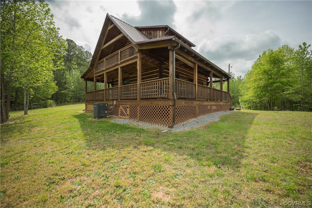 2095 Eureka Mill Road Keysville, VA 23947 - Photo 21 of 43 a view of backyard with small cabin