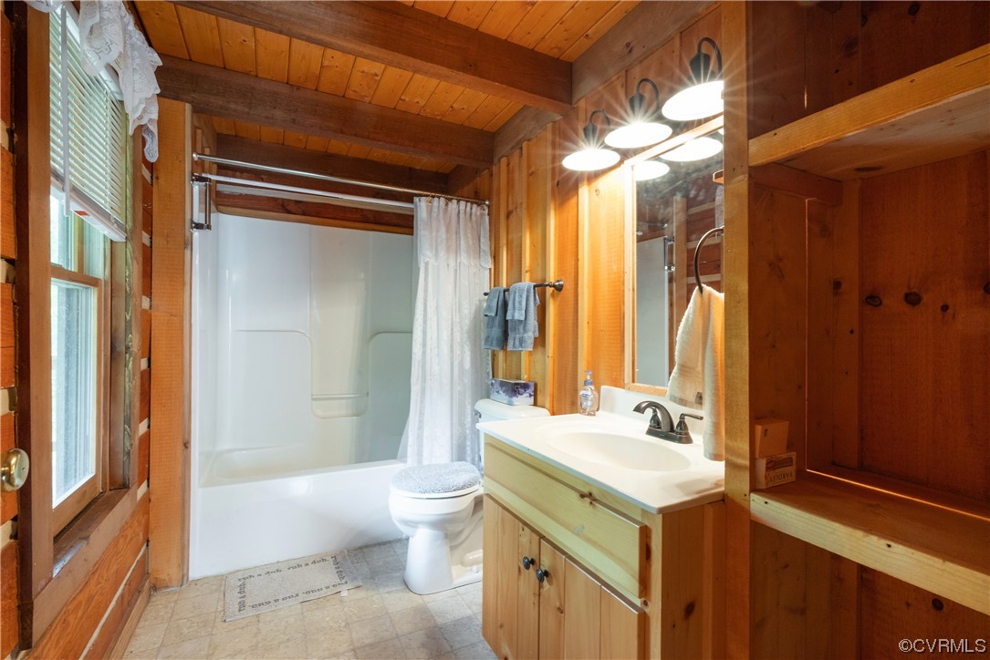 2095 Eureka Mill Road Keysville, VA 23947 - Photo 36 of 43 a bathroom with a double vanity sink toilet and shower