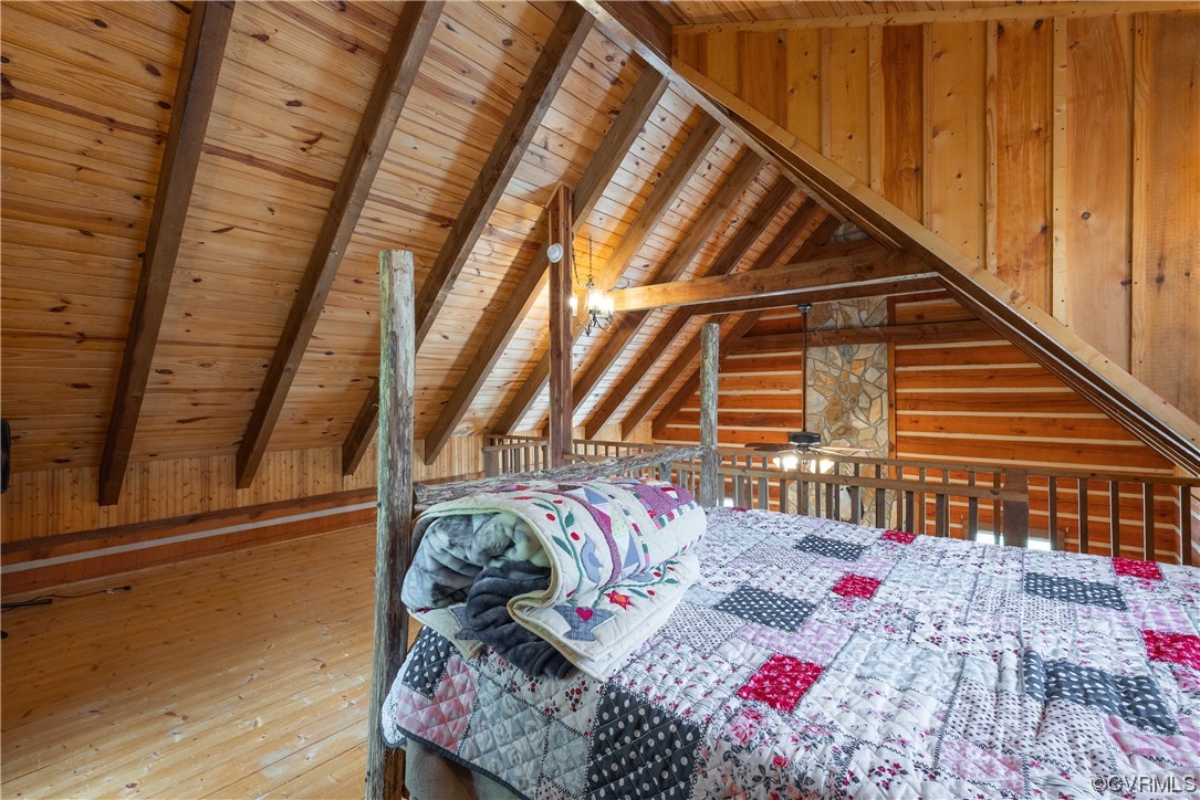 2095 Eureka Mill Road Keysville, VA 23947 - Photo 40 of 43 a bed sitting in a bedroom next to a balcony