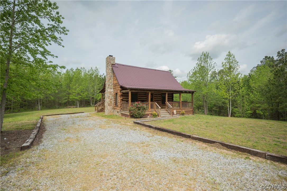 2095 Eureka Mill Road Keysville, VA 23947 - Photo 7 of 43 a view of a house with backyard and sitting area
