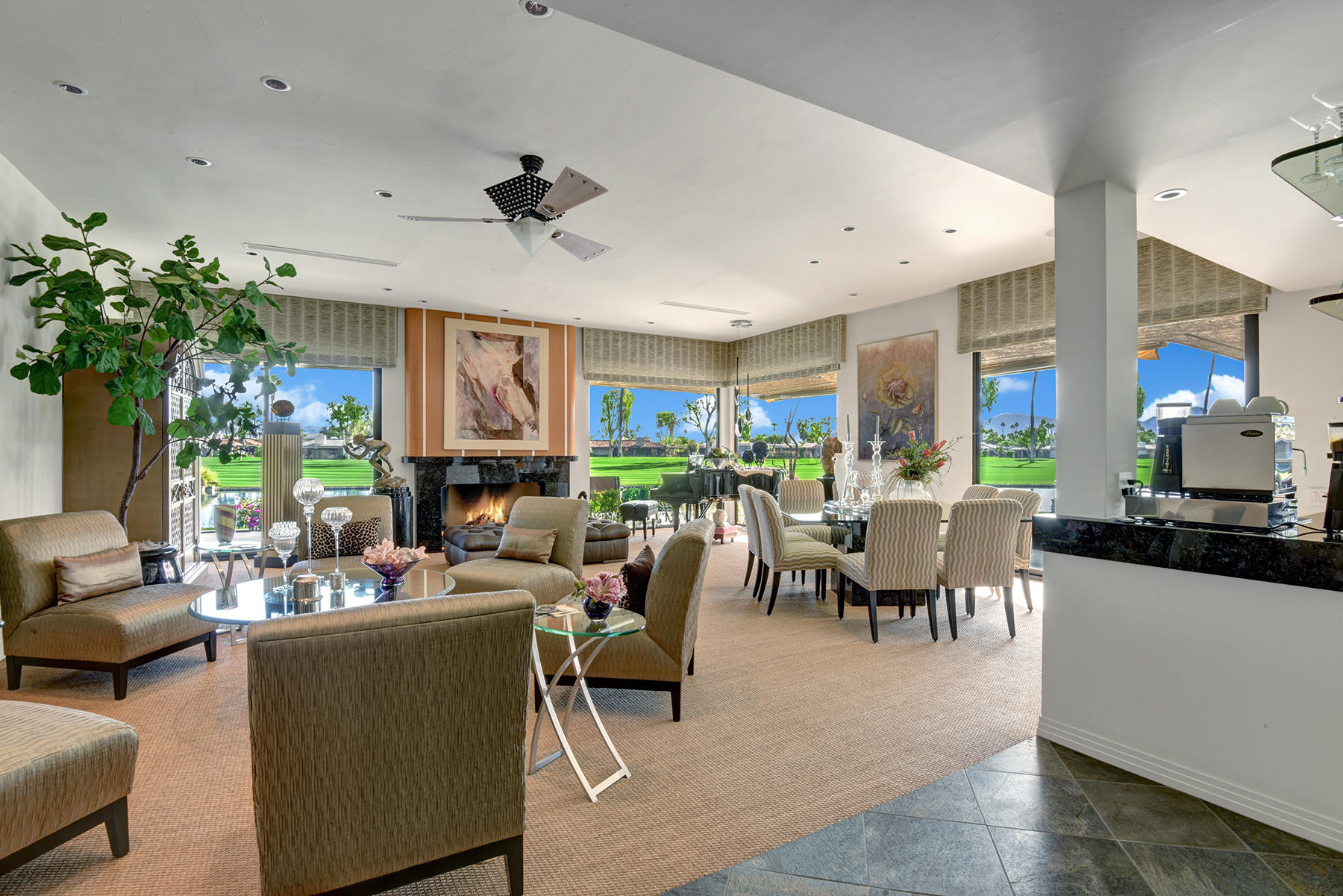 8 Rutgers Court Rancho Mirage, CA 92270 - Photo 13 of 57 a living room with furniture dining area and a fireplace