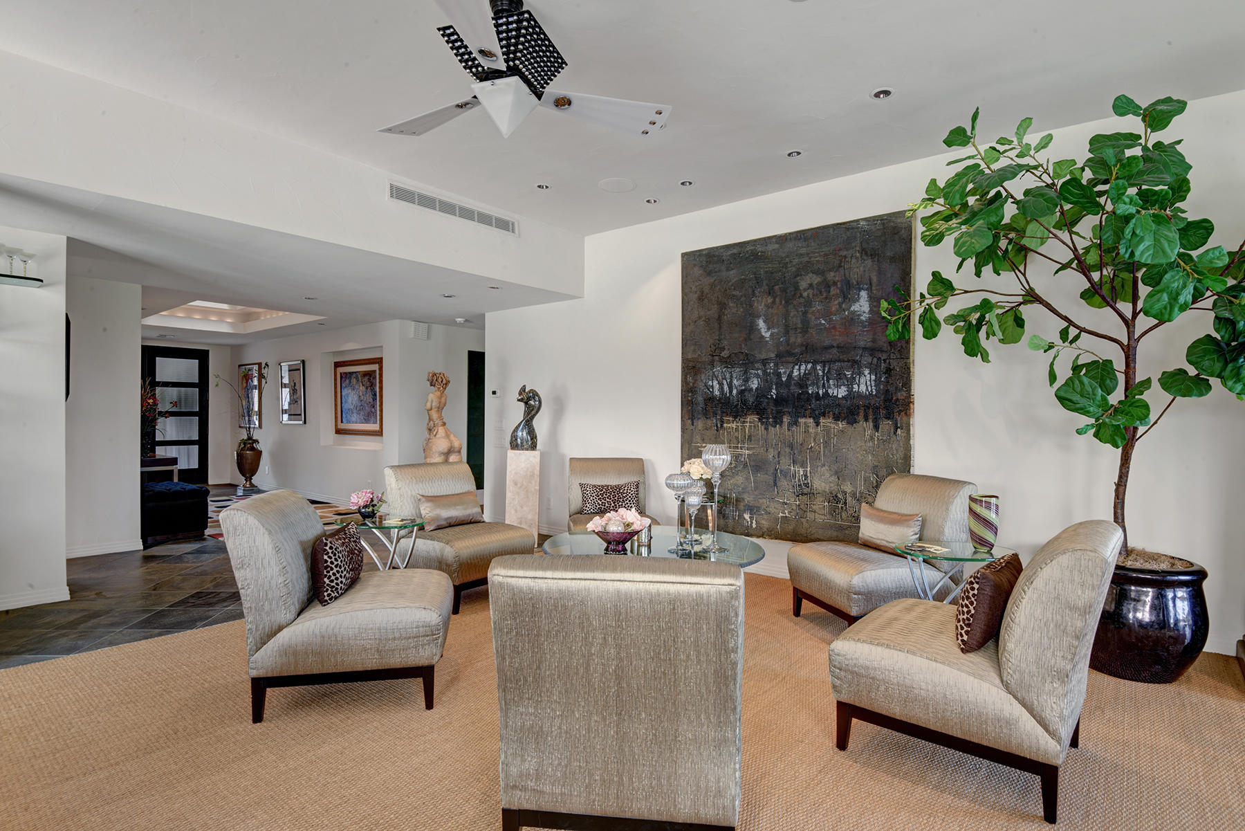 8 Rutgers Court Rancho Mirage, CA 92270 - Photo 15 of 57 a living room with furniture and a potted plant
