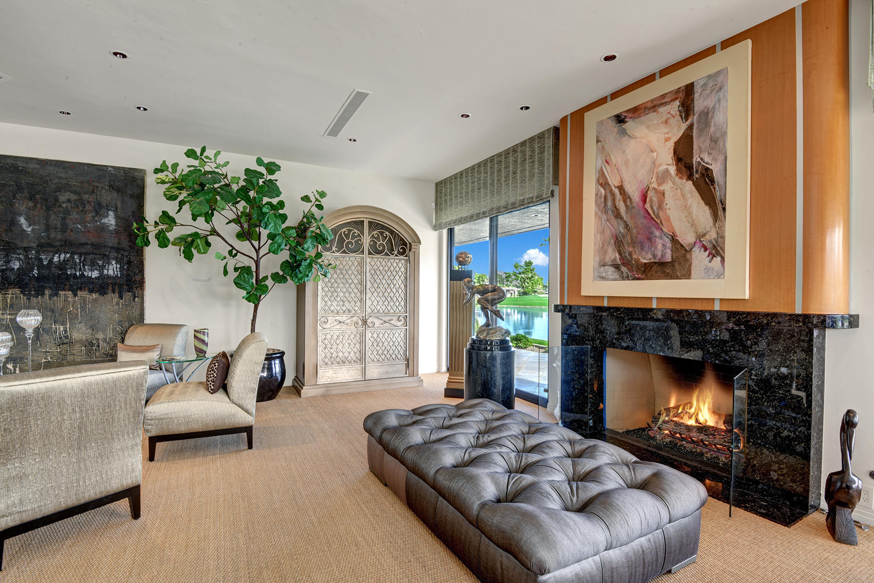 8 Rutgers Court Rancho Mirage, CA 92270 - Photo 16 of 57 a living room with furniture and a fireplace