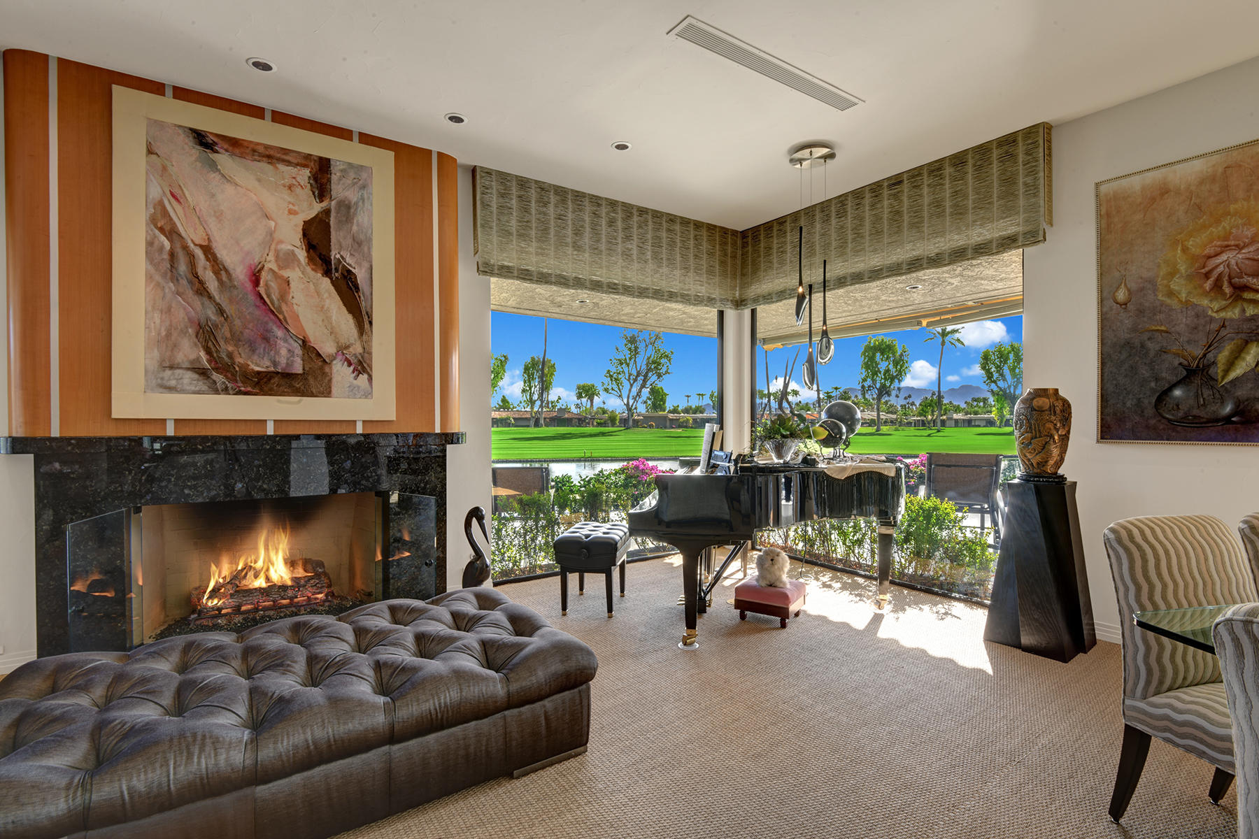 8 Rutgers Court Rancho Mirage, CA 92270 - Photo 17 of 57 a living room with furniture and a fireplace