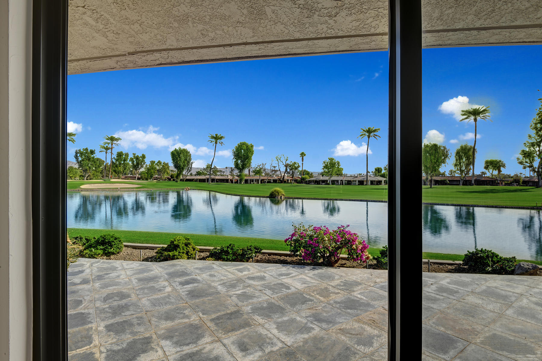 8 Rutgers Court Rancho Mirage, CA 92270 - Photo 18 of 57 a view of a bench in front of a building