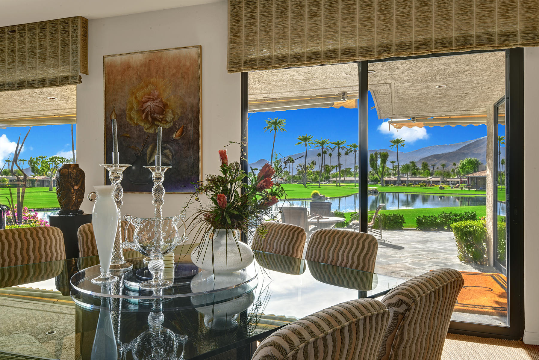 8 Rutgers Court Rancho Mirage, CA 92270 - Photo 19 of 57 a view of a patio with couches chairs potted plants and a potted plant