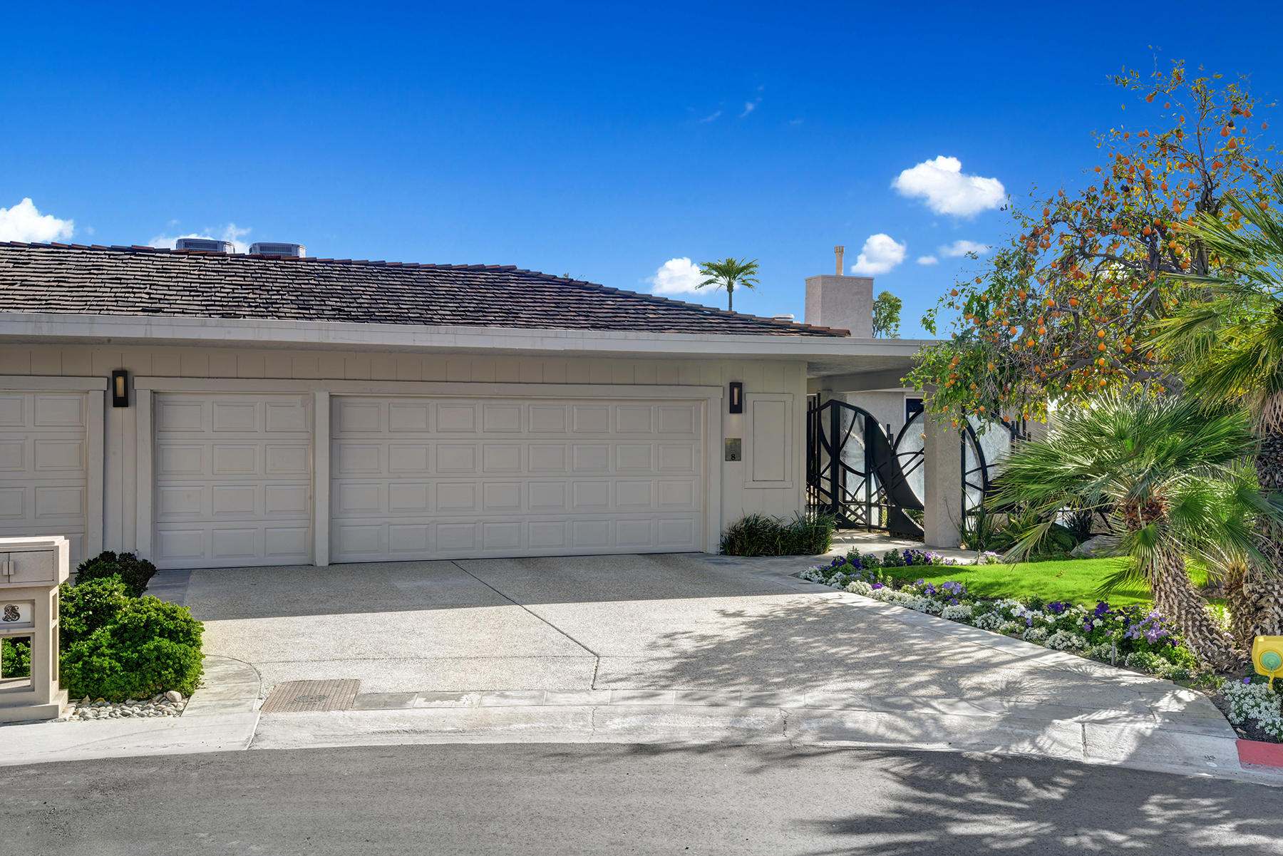 8 Rutgers Court Rancho Mirage, CA 92270 - Photo 3 of 57 a front view of a house