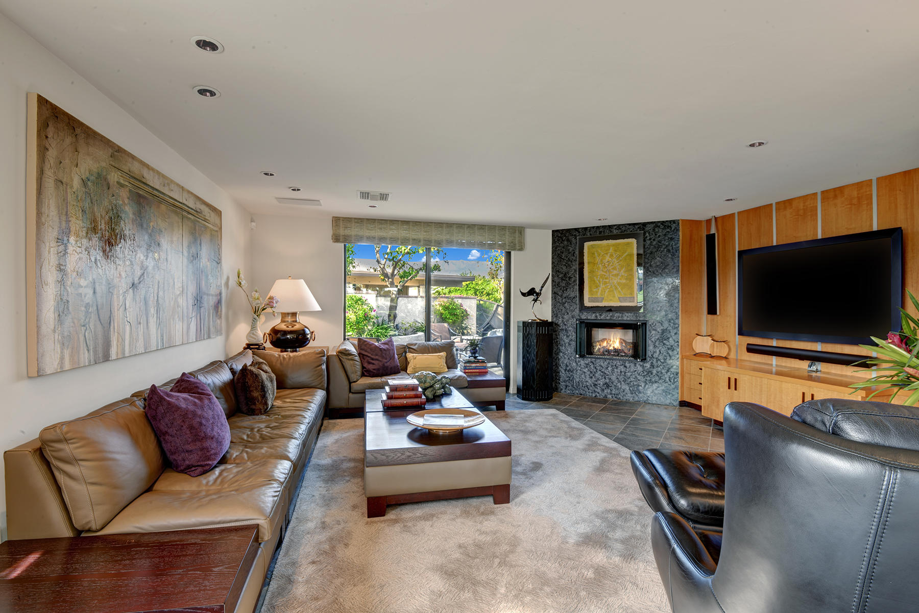 8 Rutgers Court Rancho Mirage, CA 92270 - Photo 29 of 57 a living room with furniture and a flat screen tv