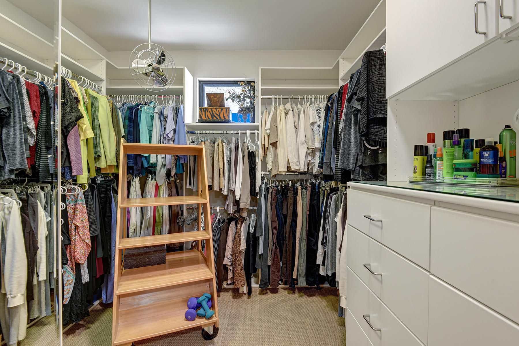 8 Rutgers Court Rancho Mirage, CA 92270 - Photo 36 of 57 a view of walk in closet with clothes and shoes