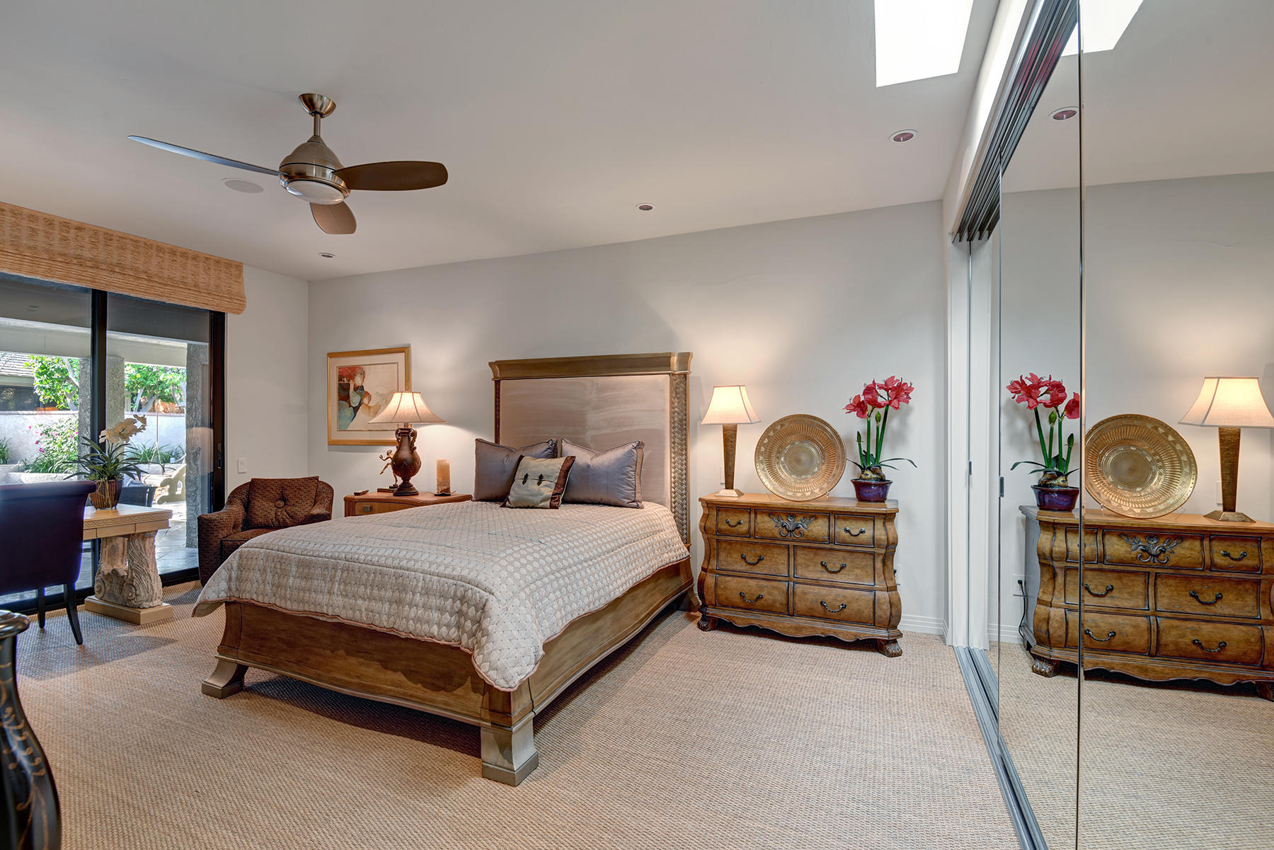 8 Rutgers Court Rancho Mirage, CA 92270 - Photo 37 of 57 a spacious bedroom with a bed and a dresser