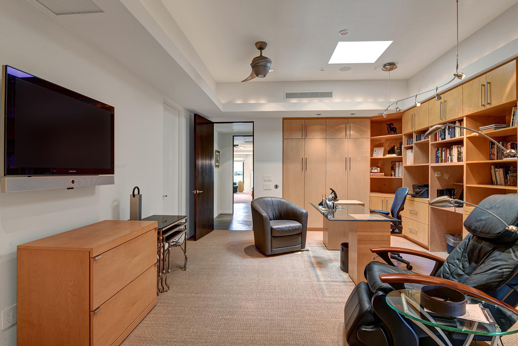 8 Rutgers Court Rancho Mirage, CA 92270 - Photo 43 of 57 a living room with furniture and a flat screen tv
