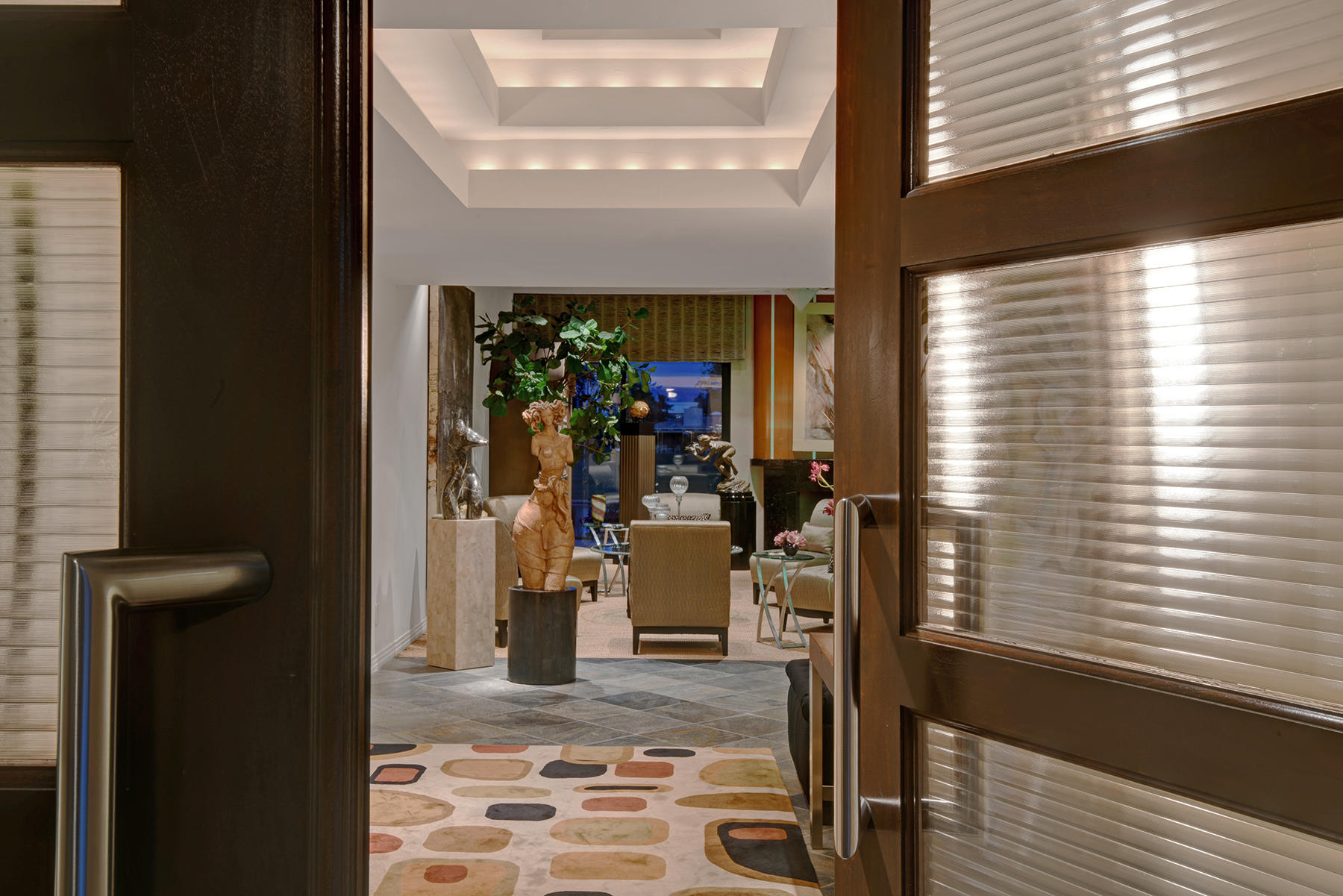 8 Rutgers Court Rancho Mirage, CA 92270 - Photo 6 of 57 a view of a entryway door front of house