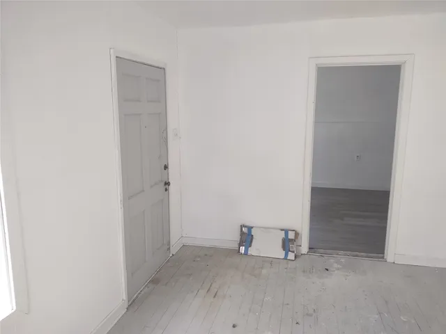 an empty room with a door