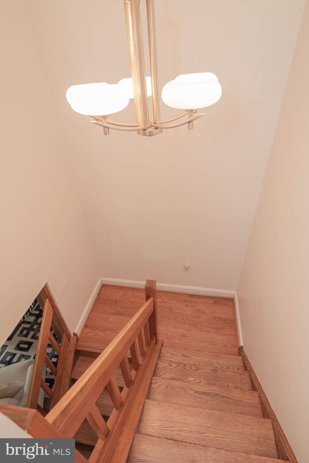 7749 Mellon Road Wyncote, PA 19095 - Photo 33 of 53 Hardwood is even on the stairs