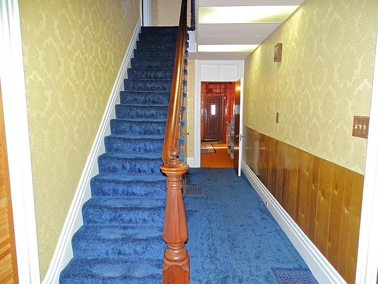 Front entry. Living room is to the left, formal dining room to the right.