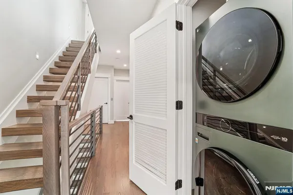 a view of a entryway with wooden floor