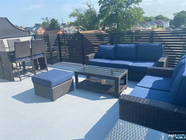 a view of a terrace with couches