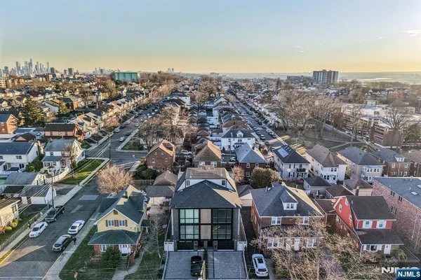 an aerial view of a city with lots of residential buildings