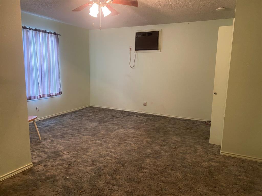 808 North Hughes Street Howe, TX 75459 - Photo 15 of 19 a view of an empty room and window