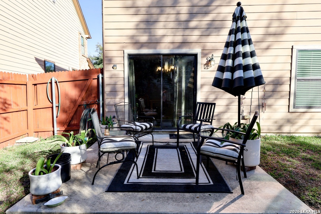 9927 Hawk Village Converse, TX 78109 - Photo 20 of 25 a view of backyard with sitting area