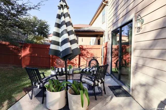 a house view with a seating space and garden view