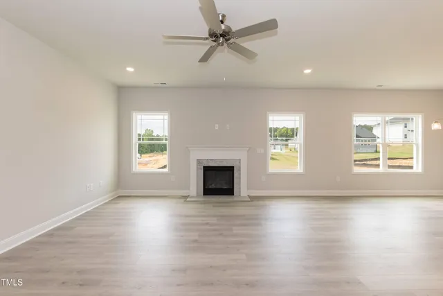 a bedroom with a bed and a tv