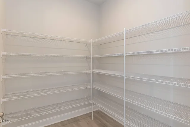 a view of a swimming pool with a yard