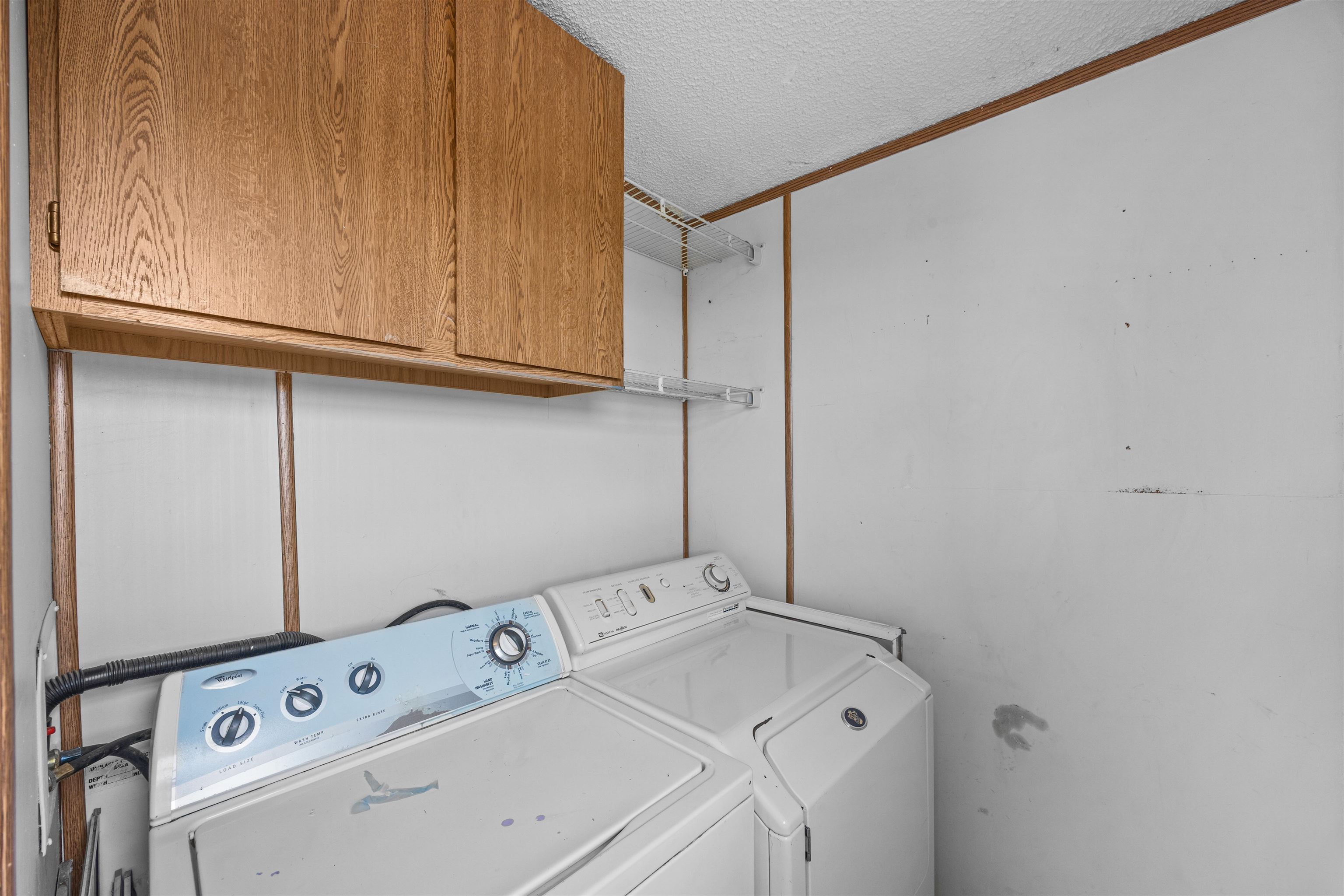 21431 Little Park Road Grand Junction, CO 81507 - Photo 9 of 40 a utility room with dryer and washer
