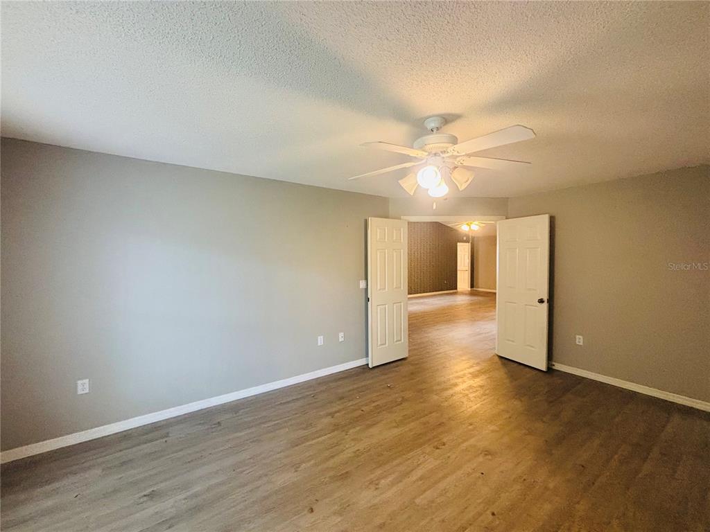 177 North Golf Harbor Path Inverness, FL 34450 - Photo 16 of 27 a view of an empty room with wooden floor
