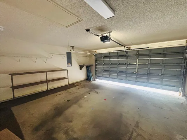 a view of a garage with storage