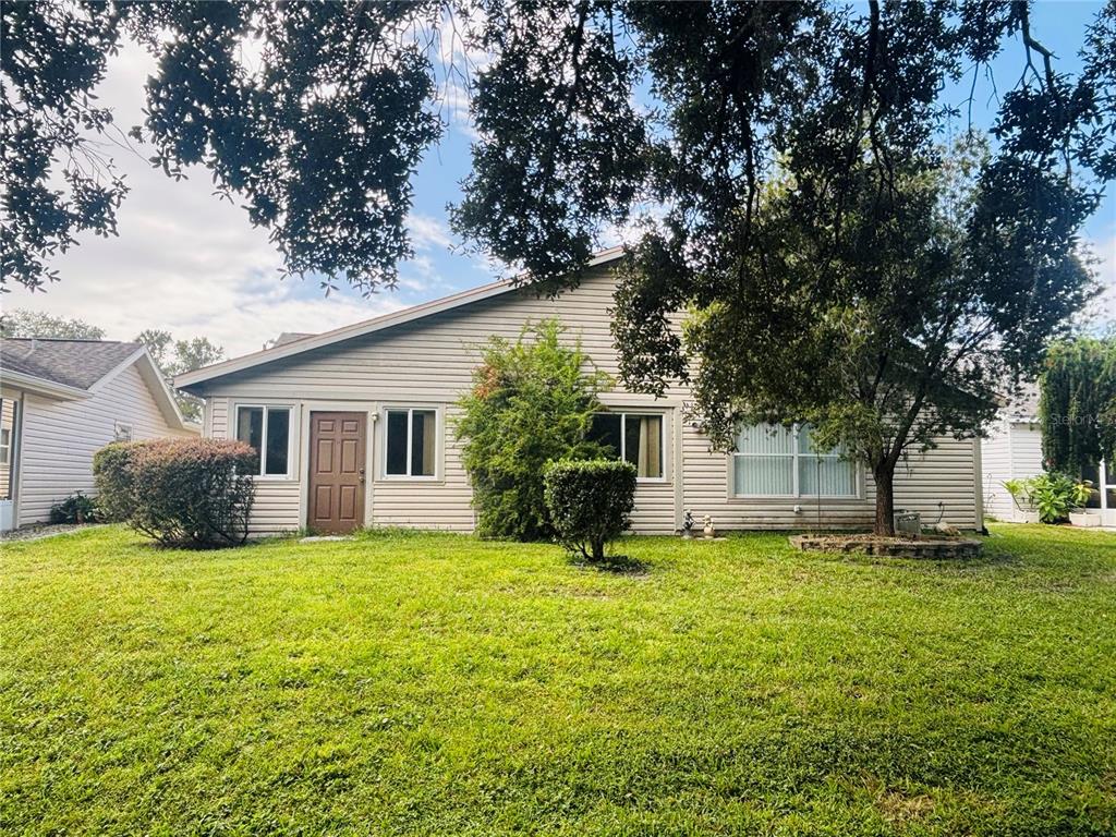 177 North Golf Harbor Path Inverness, FL 34450 - Photo 3 of 27 a view of a house with a yard